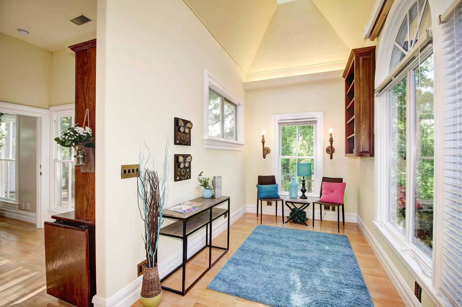 4434 Mapel Lane Carmichael, CA 95608 - Photo 43 of 72 a living room with furniture a rug and a table