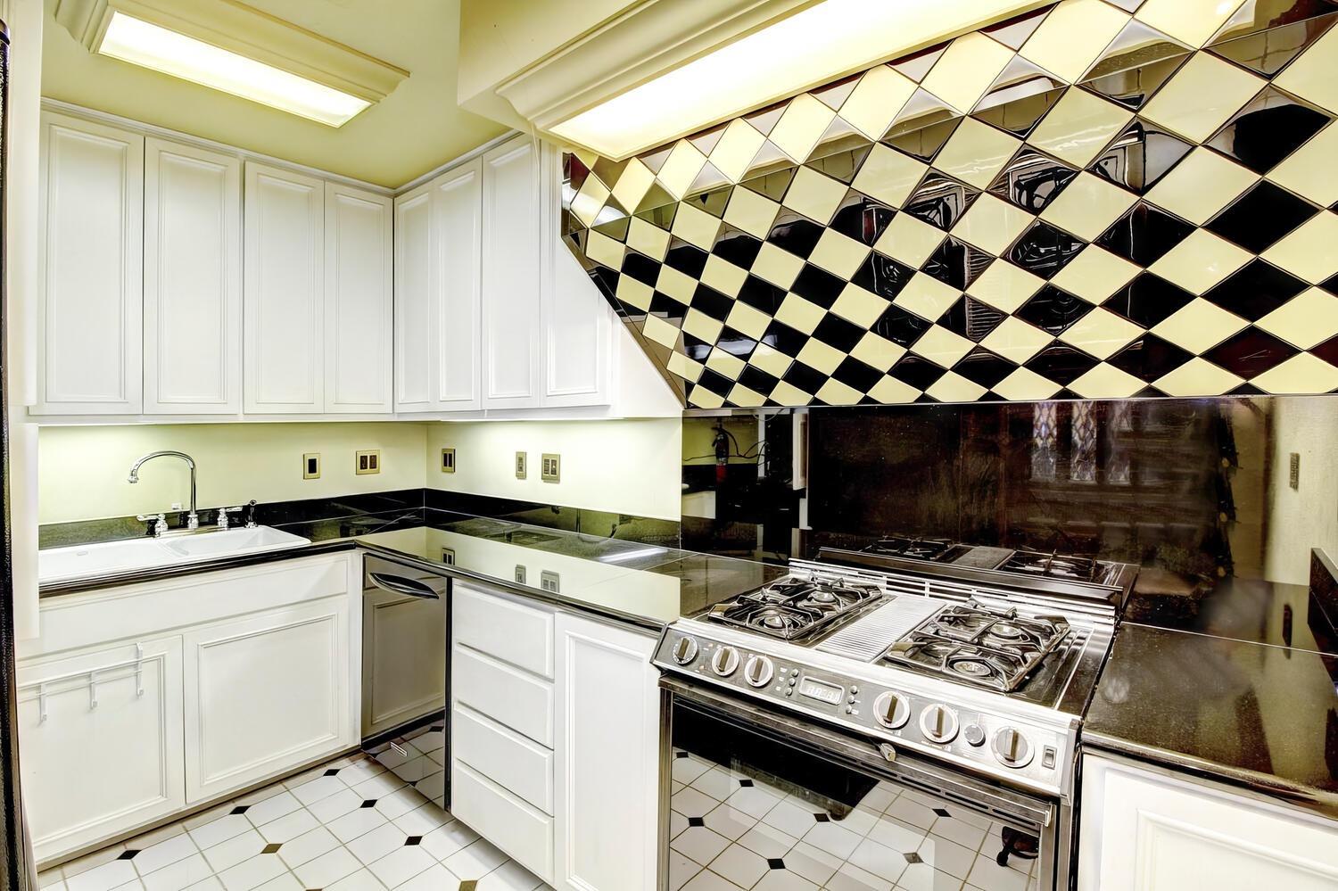 4434 Mapel Lane Carmichael, CA 95608 - Photo 45 of 72 a kitchen with a stove a sink and a microwave