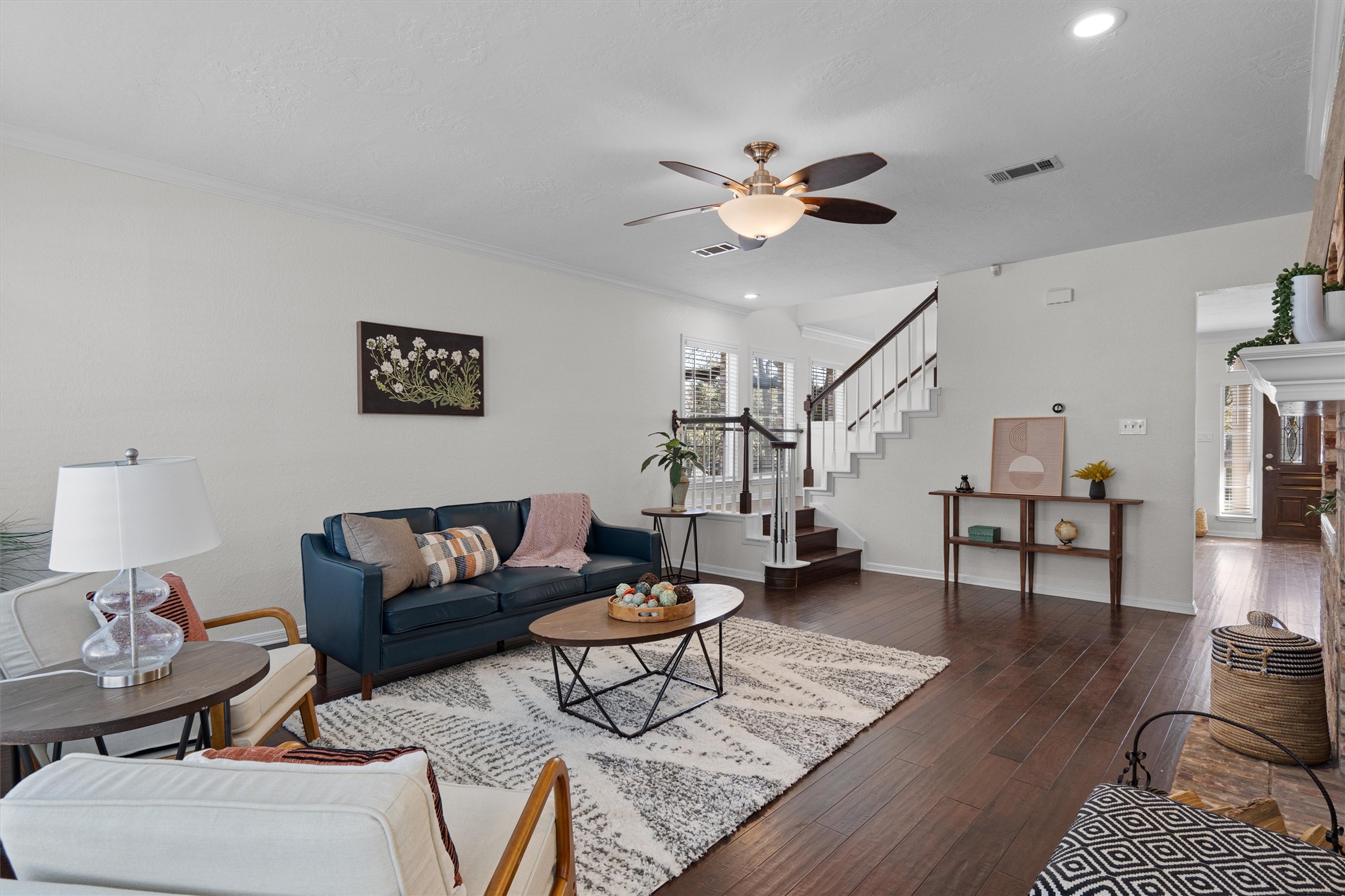 10506 Walpole Lane Austin, TX 78739 - Photo 11 of 40 Living room with a ceiling fan, dark wood finished floors, and recessed lighting