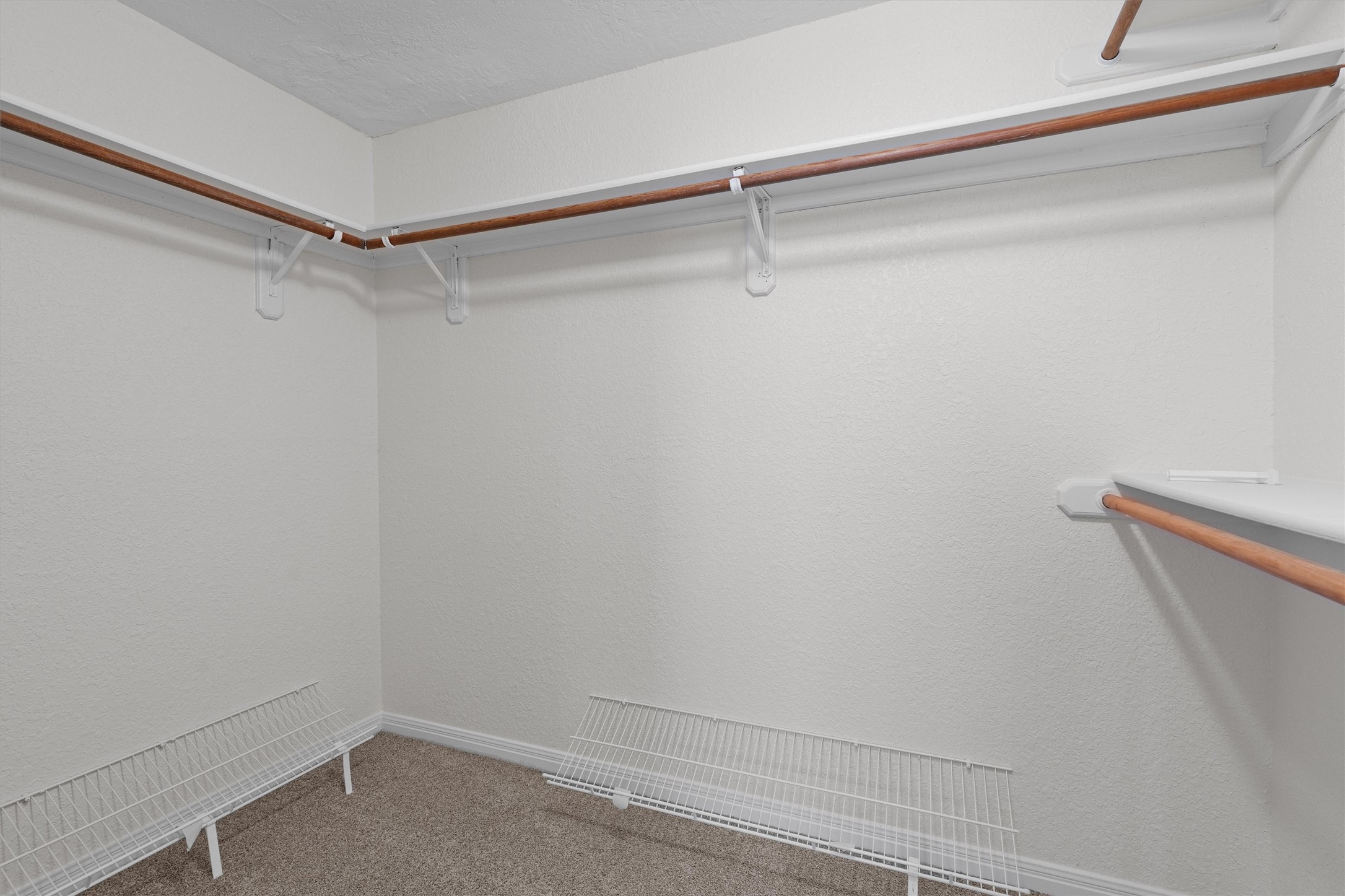 10506 Walpole Lane Austin, TX 78739 - Photo 27 of 40 Walk in closet with carpet