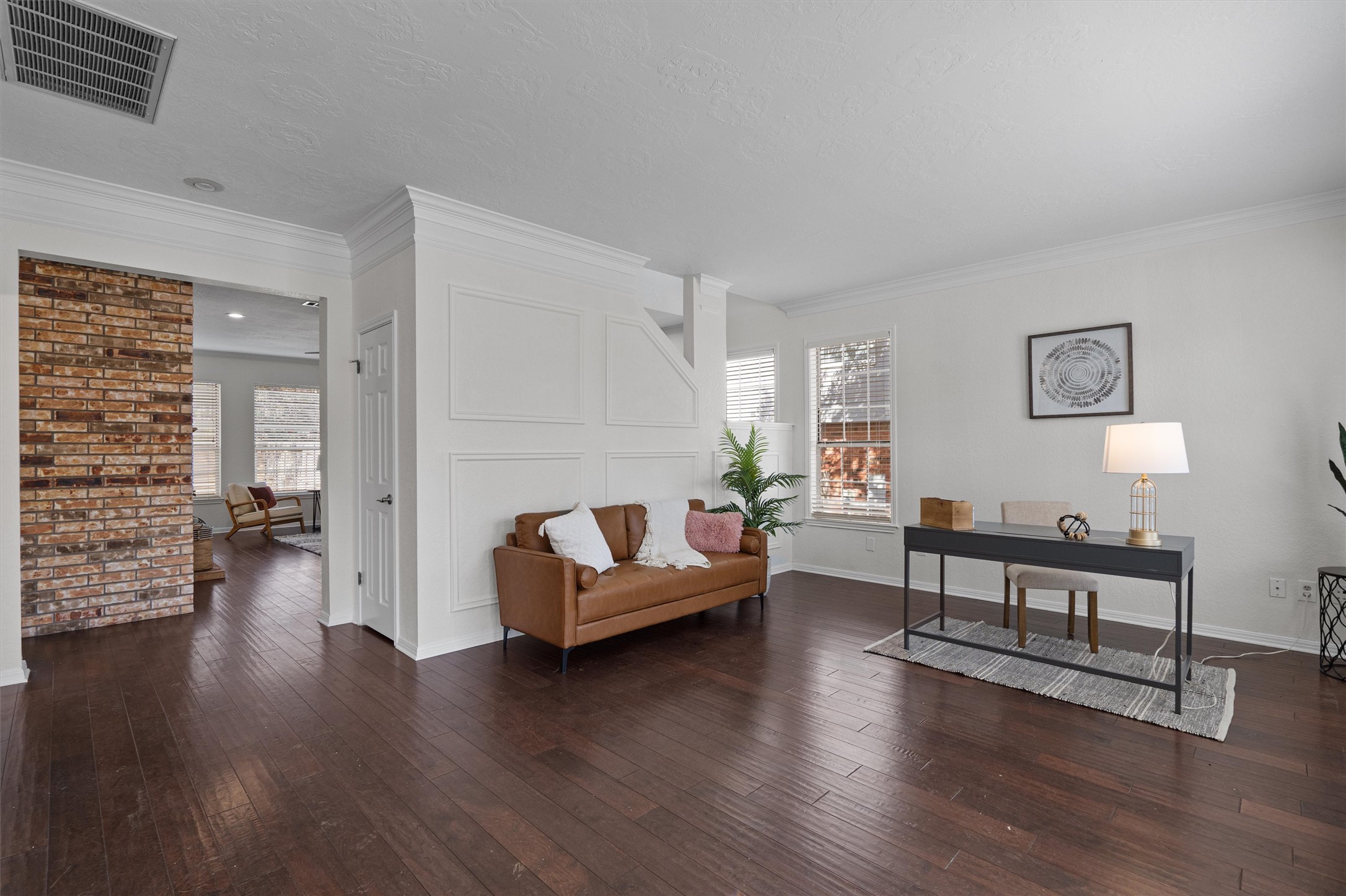 10506 Walpole Lane Austin, TX 78739 - Photo 5 of 40 Sitting room with crown molding, dark wood-type flooring, and a desk
