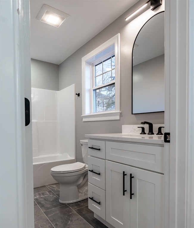 214 Horton Street Fall River, MA 02723 - Photo 14 of 40 a bathroom with a sink toilet and shower