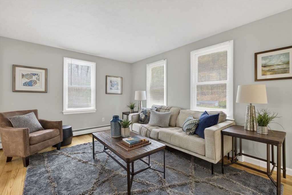 111 Goss Lane Lancaster, MA 01523 - Photo 14 of 39 a living room with furniture and a window