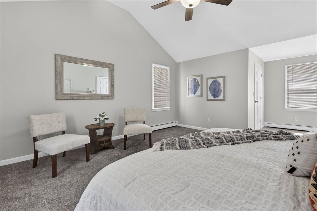 111 Goss Lane Lancaster, MA 01523 - Photo 22 of 39 a bedroom with a bed and a couch