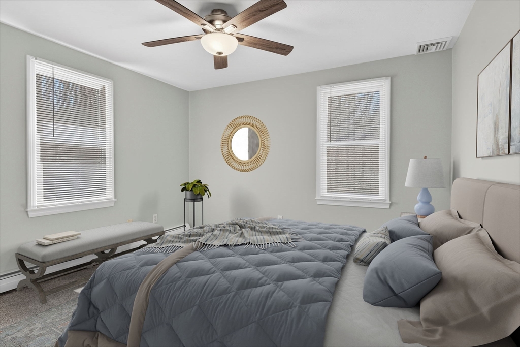 111 Goss Lane Lancaster, MA 01523 - Photo 26 of 39 a bedroom with a bed furniture and a window