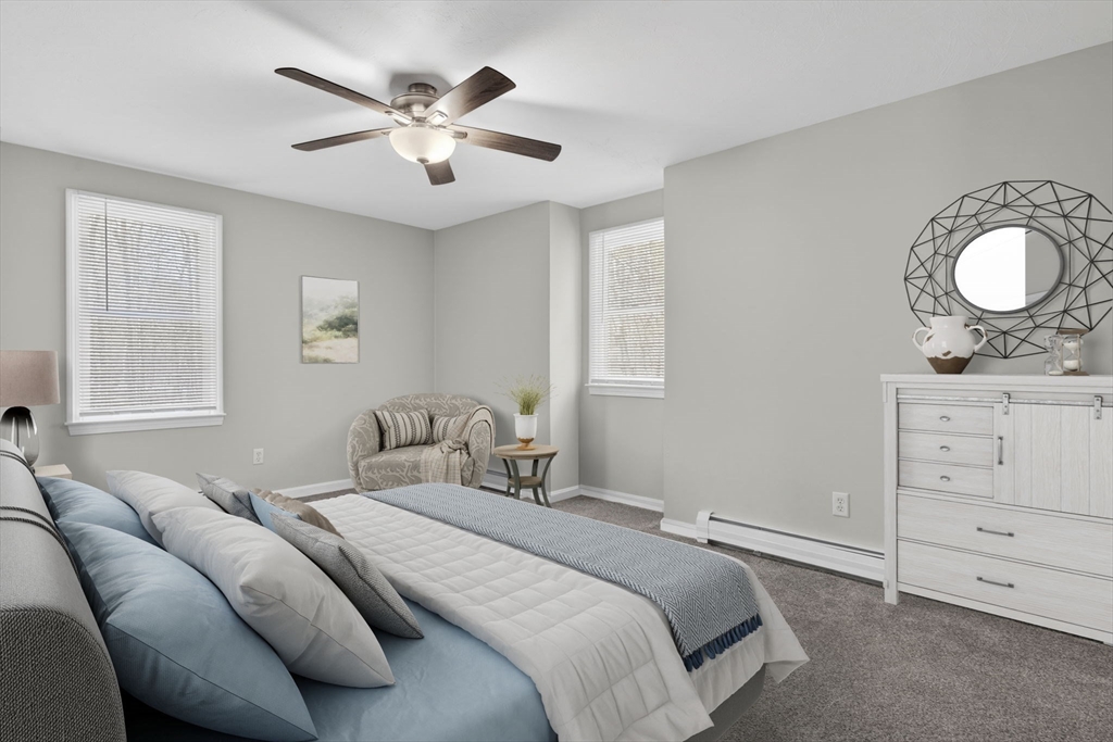 111 Goss Lane Lancaster, MA 01523 - Photo 27 of 39 a bedroom with a bed and window