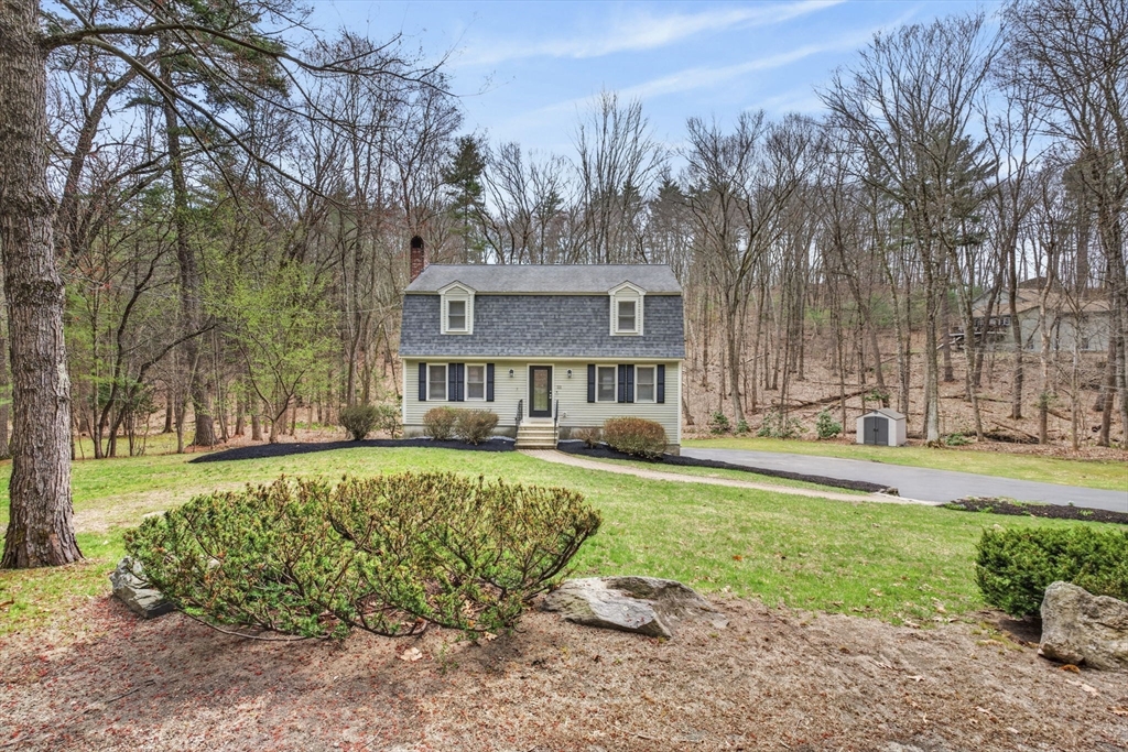 111 Goss Lane Lancaster, MA 01523 - Photo 33 of 39 a front view of a house with garden