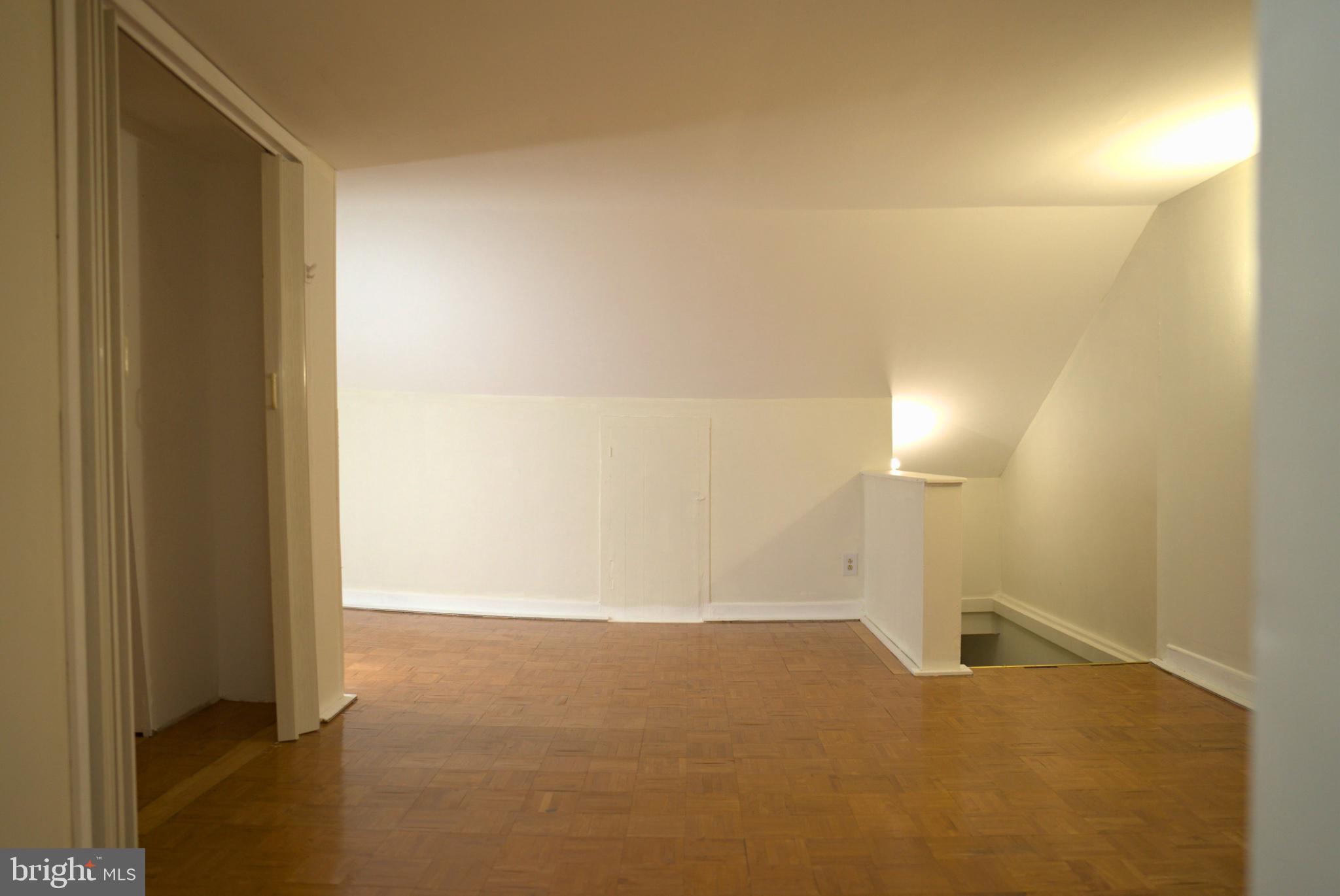 74 South Cedar Street Hazleton, PA 18201 - Photo 13 of 15 Spacious attic retreat with natural light.