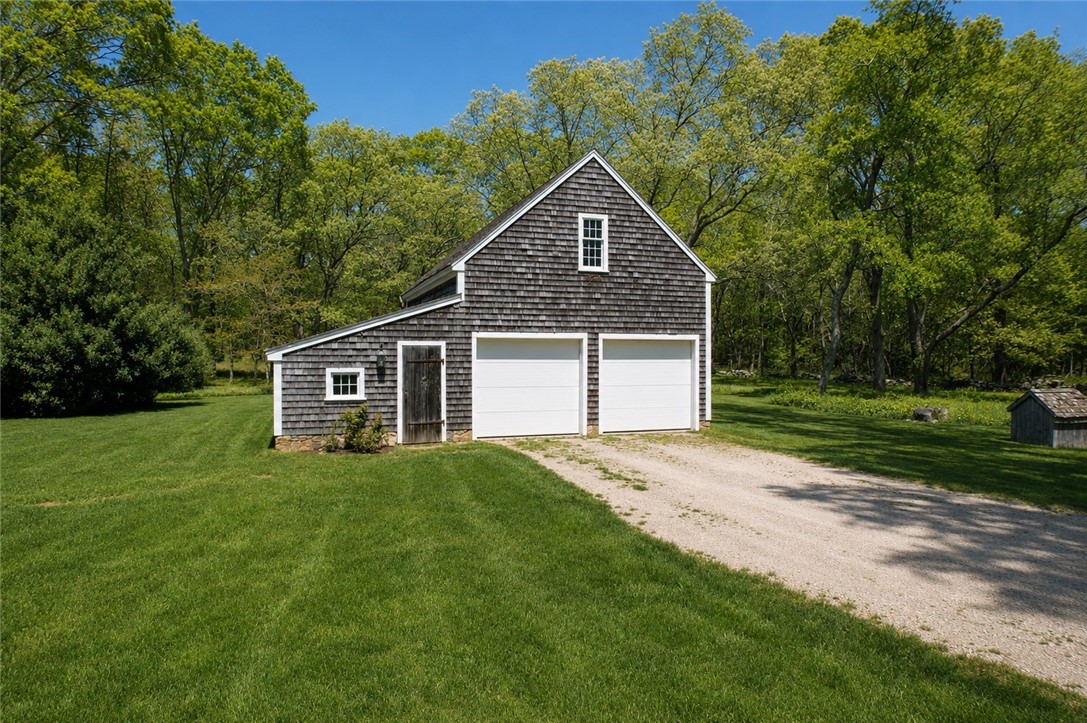 307 Stony Fort Road Saunderstown, RI 02874 - Photo 7 of 48 Detached post and beam three car garage. The third garage is around the corner.