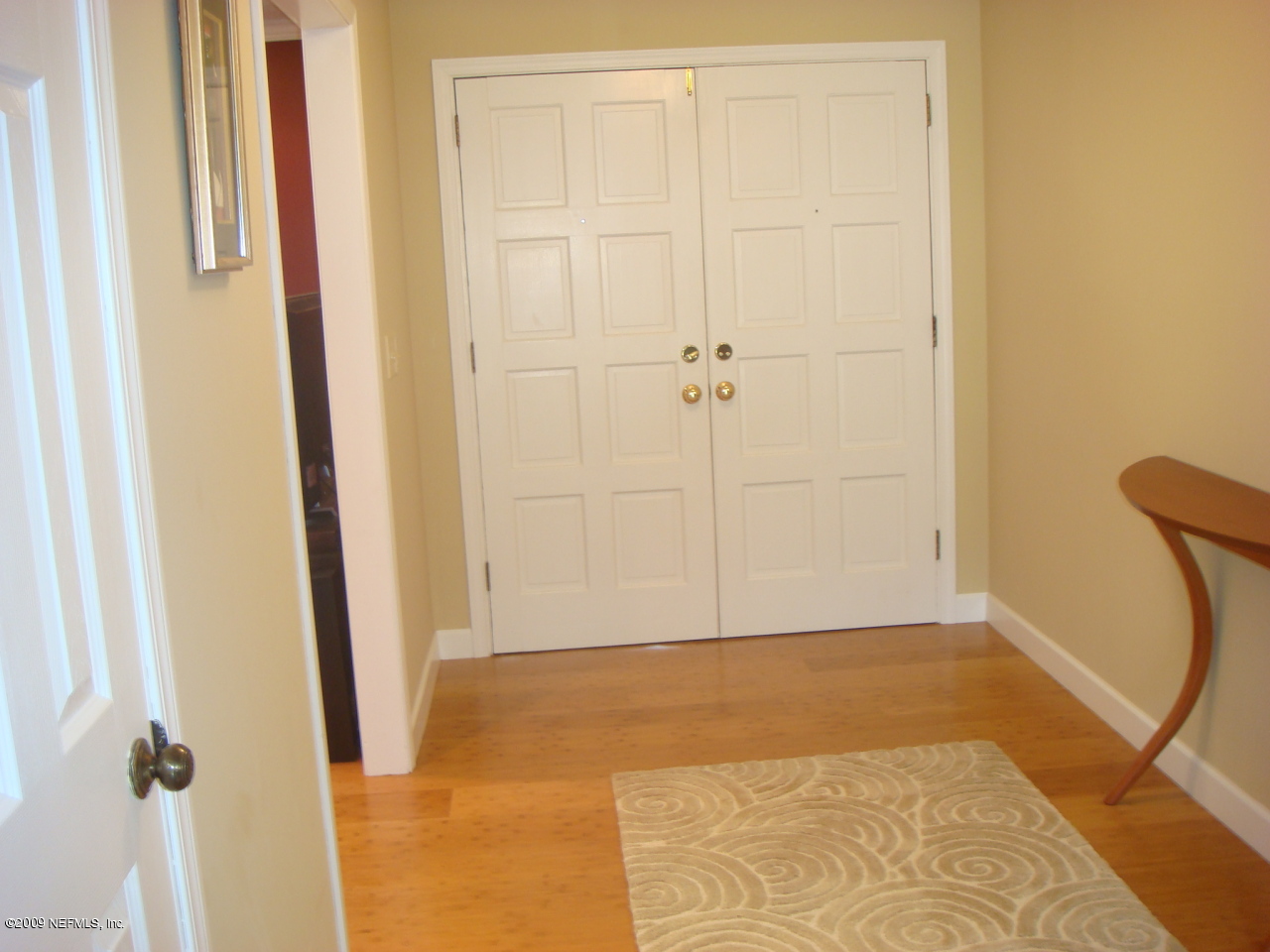 9529 Kuhn Road Jacksonville, FL 32257 - Photo 3 of 26 a view of a room with wooden floor and bathroom