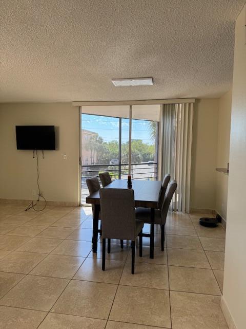 3100 North Pine Island Road, Unit 301 Sunrise, FL 33351 - Photo 6 of 9 lc dining room