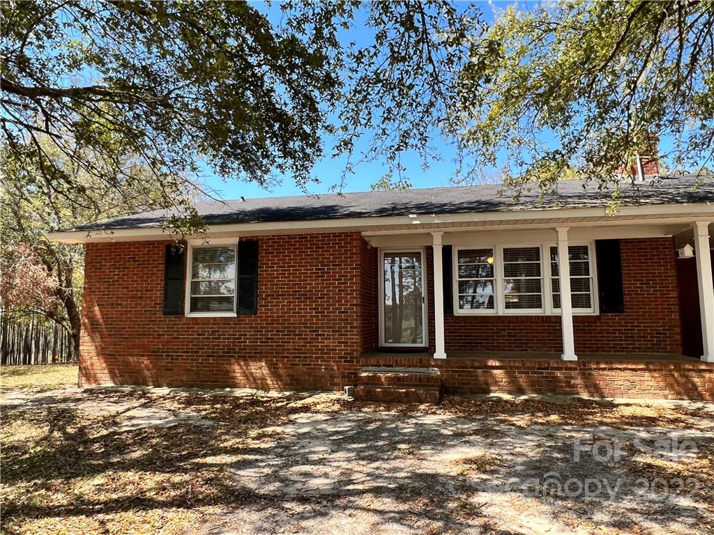 4114 Hartsville-Ruby Road Patrick, SC 29584 - Photo 2 of 48 a front view of a house with a yard