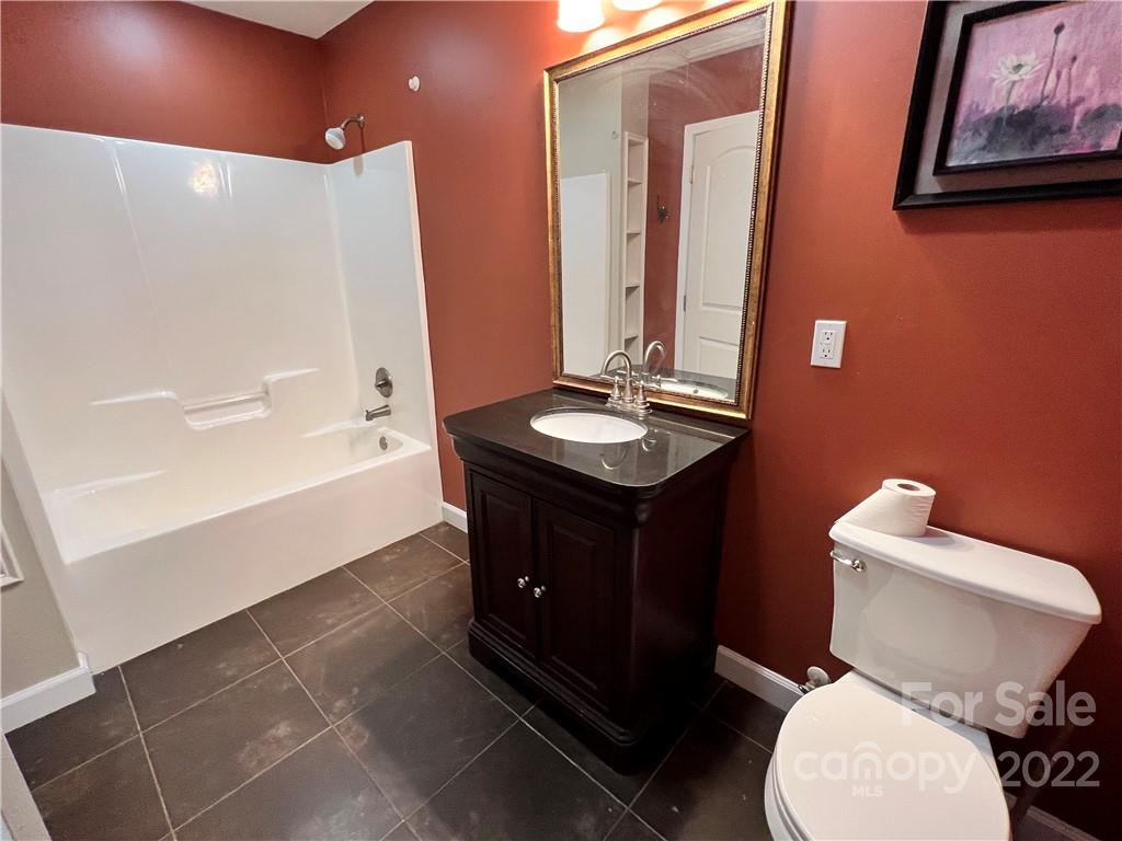 4114 Hartsville-Ruby Road Patrick, SC 29584 - Photo 23 of 48 a bathroom with a sink a toilet and shower