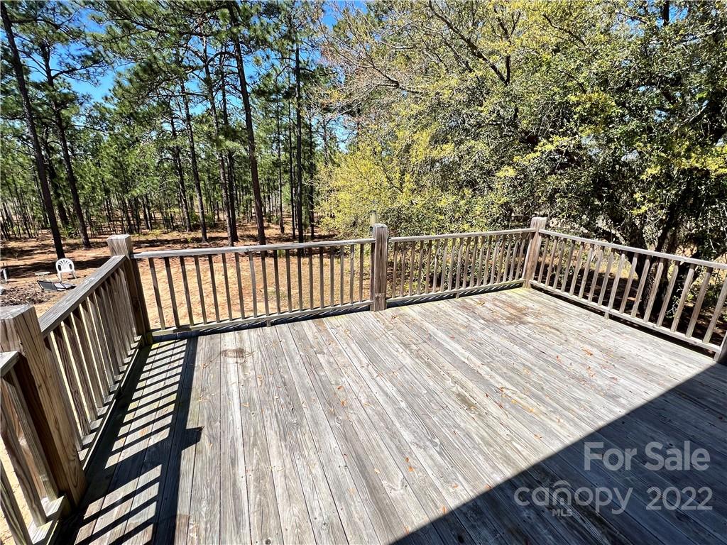 4114 Hartsville-Ruby Road Patrick, SC 29584 - Photo 26 of 48 a view of balcony with wooden floor