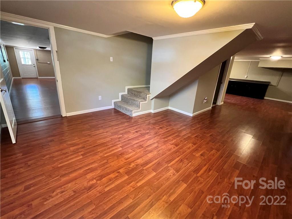 4114 Hartsville-Ruby Road Patrick, SC 29584 - Photo 30 of 48 a view of a livingroom with wooden floor