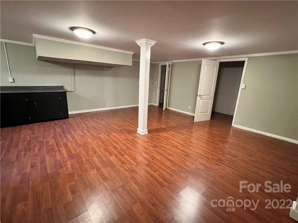 4114 Hartsville-Ruby Road Patrick, SC 29584 - Photo 31 of 48 a view of an empty room with wooden floor
