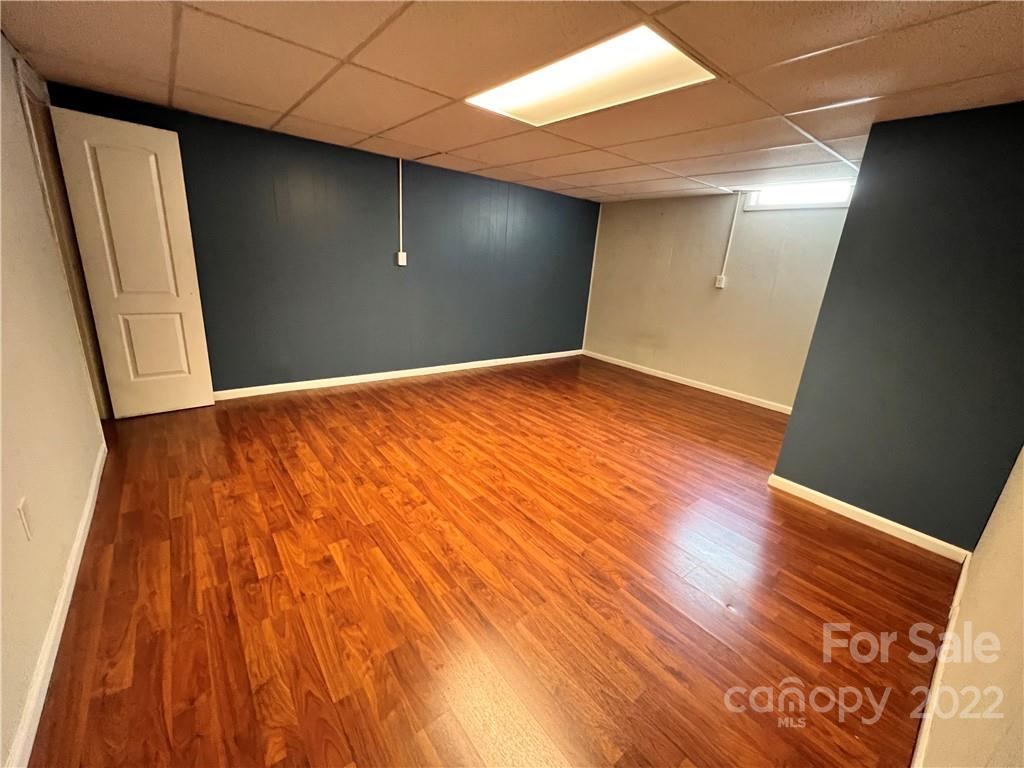 4114 Hartsville-Ruby Road Patrick, SC 29584 - Photo 35 of 48 a view of empty room with wooden floor