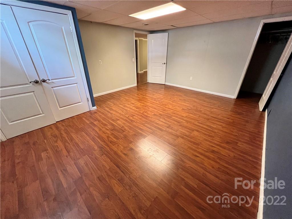 4114 Hartsville-Ruby Road Patrick, SC 29584 - Photo 36 of 48 a view of empty room with wooden floor