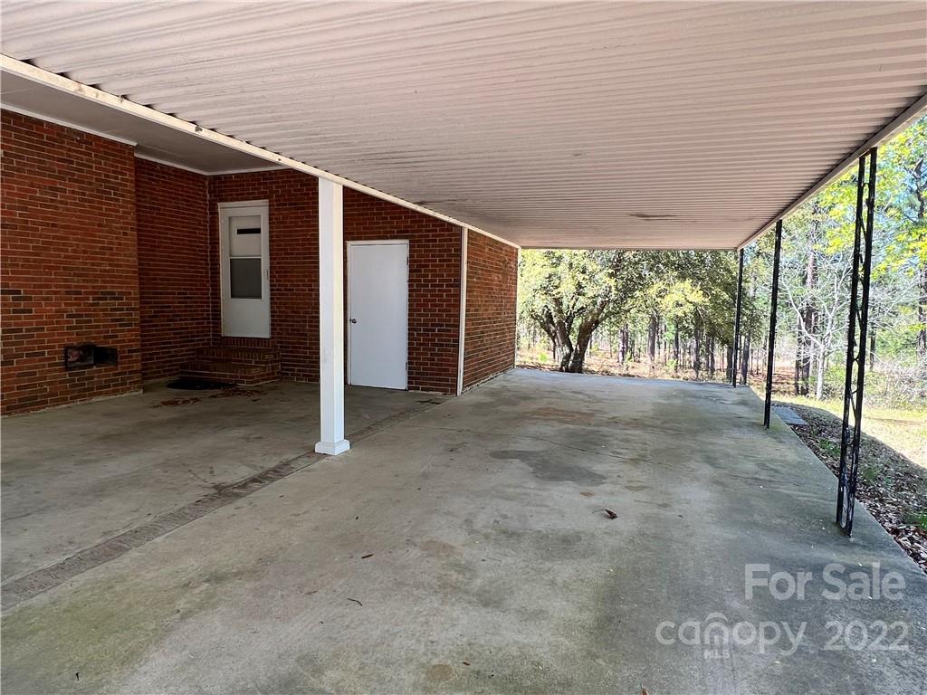 4114 Hartsville-Ruby Road Patrick, SC 29584 - Photo 40 of 48 a view of a big room with large windows