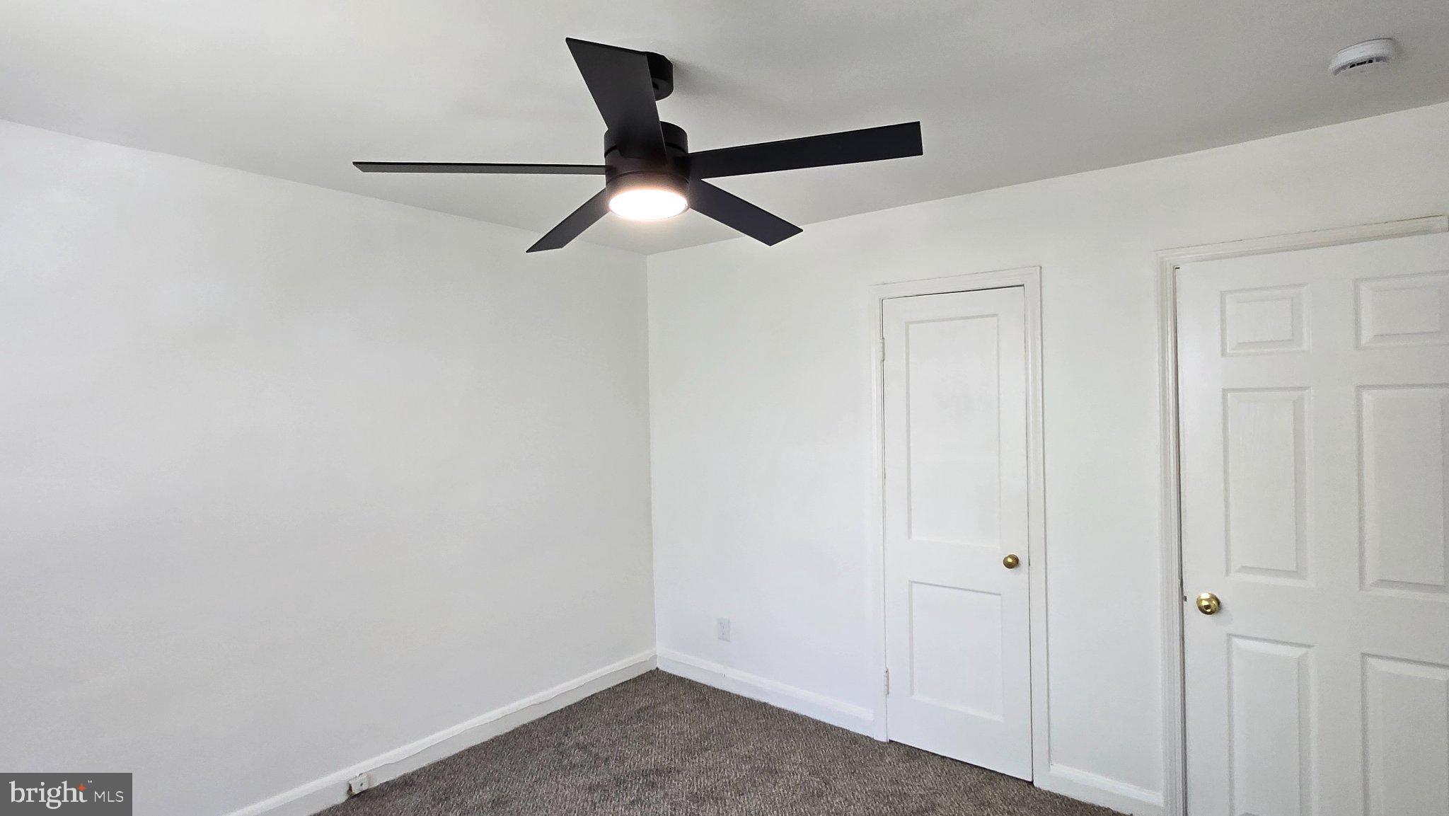 3820 Elkader Road Baltimore, MD 21218 - Photo 27 of 41 Bright and airy room with modern fan.