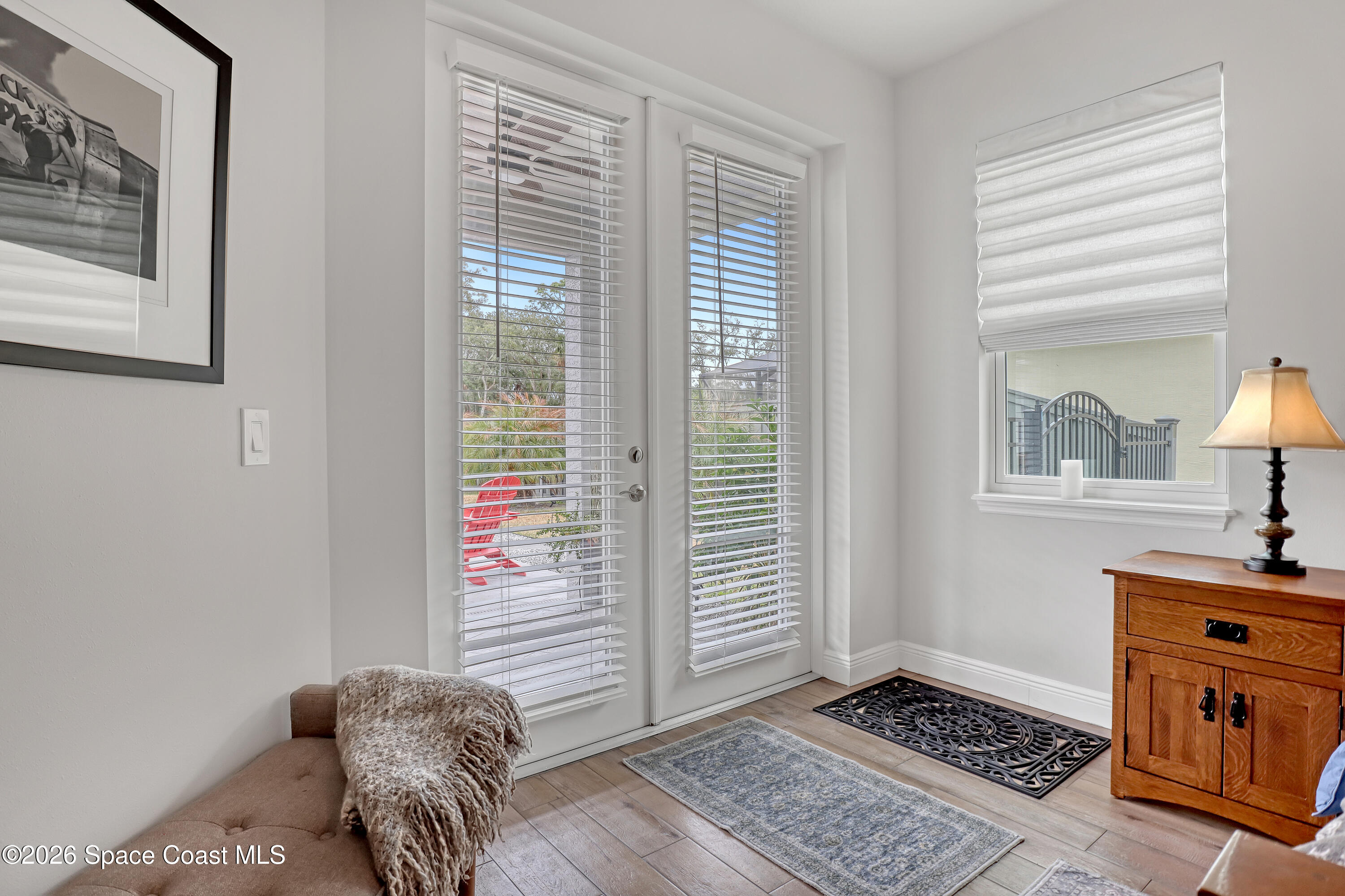1837 Market Circle Northeast Palm Bay, FL 32905 - Photo 23 of 57 a room that has a bed and a window in it