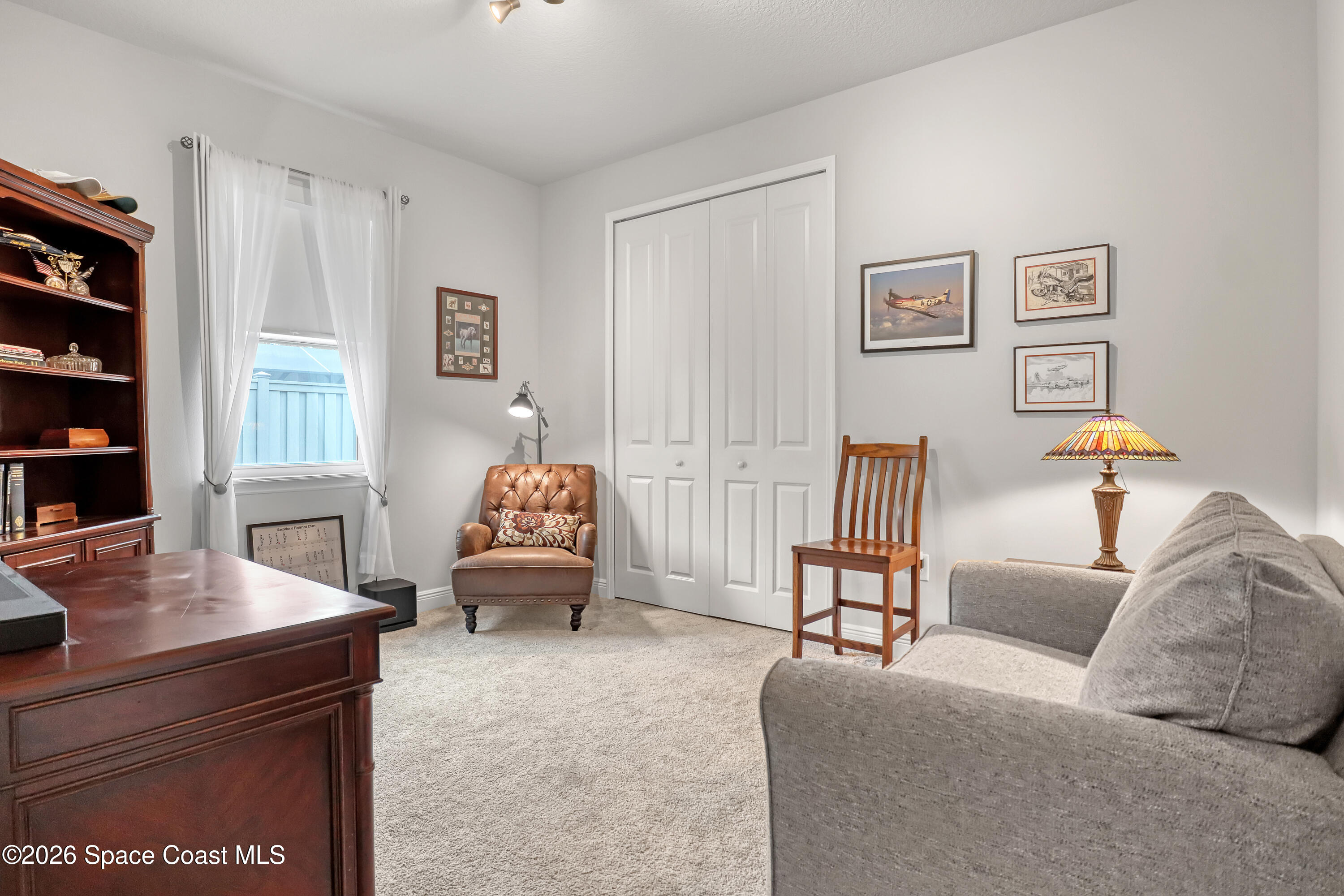 1837 Market Circle Northeast Palm Bay, FL 32905 - Photo 33 of 57 a living room with furniture and a couch