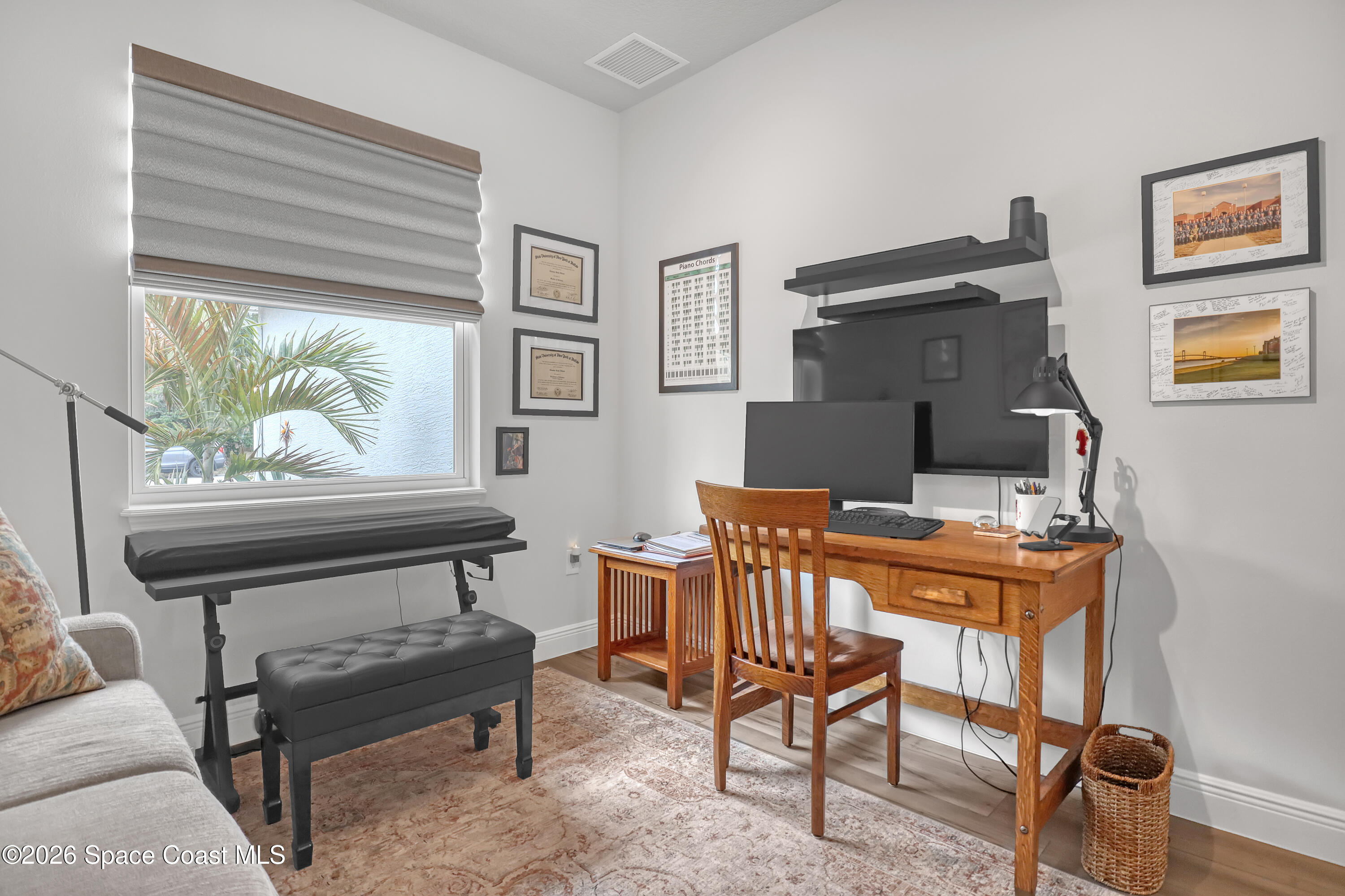 1837 Market Circle Northeast Palm Bay, FL 32905 - Photo 36 of 57 a workspace with furniture and window