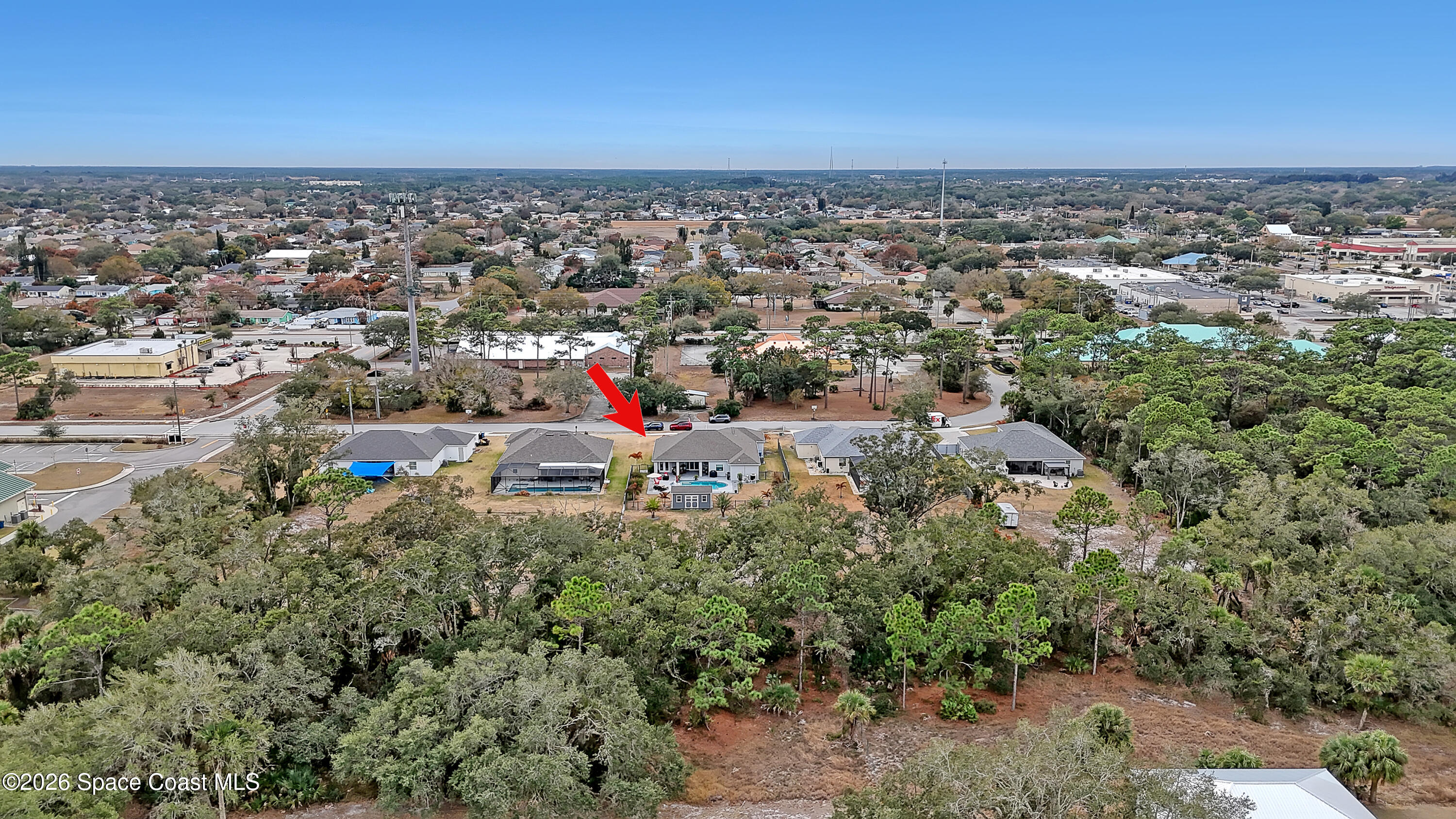 1837 Market Circle Northeast Palm Bay, FL 32905 - Photo 57 of 57 an aerial view of a houses with a yard