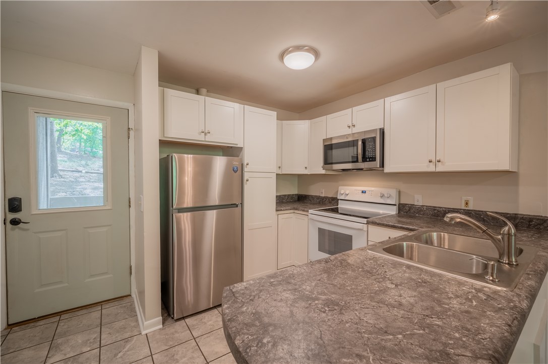 150 Ligon Street, Unit 2302 Clemson, SC 29631 - Photo 4 of 18 This functional kitchen provides a bright and inviting space for everyday living.