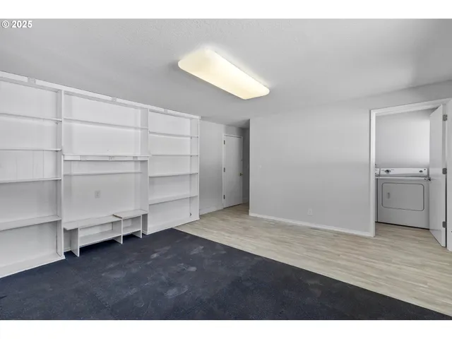a bathroom with a sink and vanity