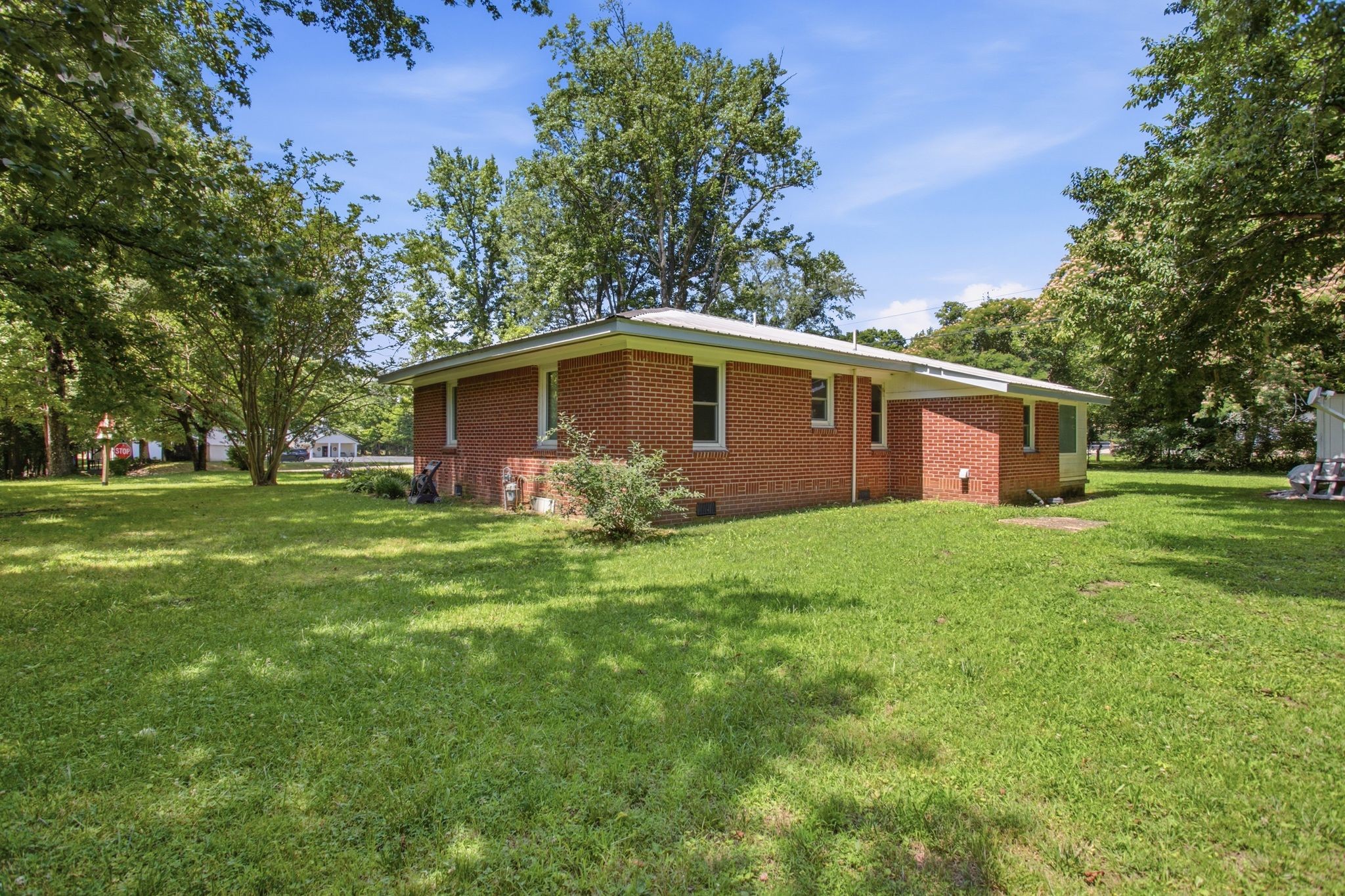150 Toms Creek Road Linden, TN 37096 - Photo 19 of 23 a front view of house with yard and green space