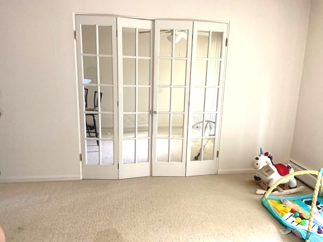 2403 South Goebbert Road, Unit 205 Arlington Heights, IL 60005 - Photo 6 of 13 a view of an empty room with a window