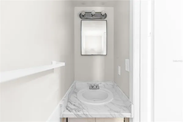 a bathroom with a sink and a bathtub