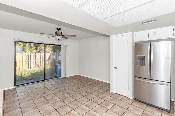 a kitchen with stainless steel appliances a refrigerator and a sink