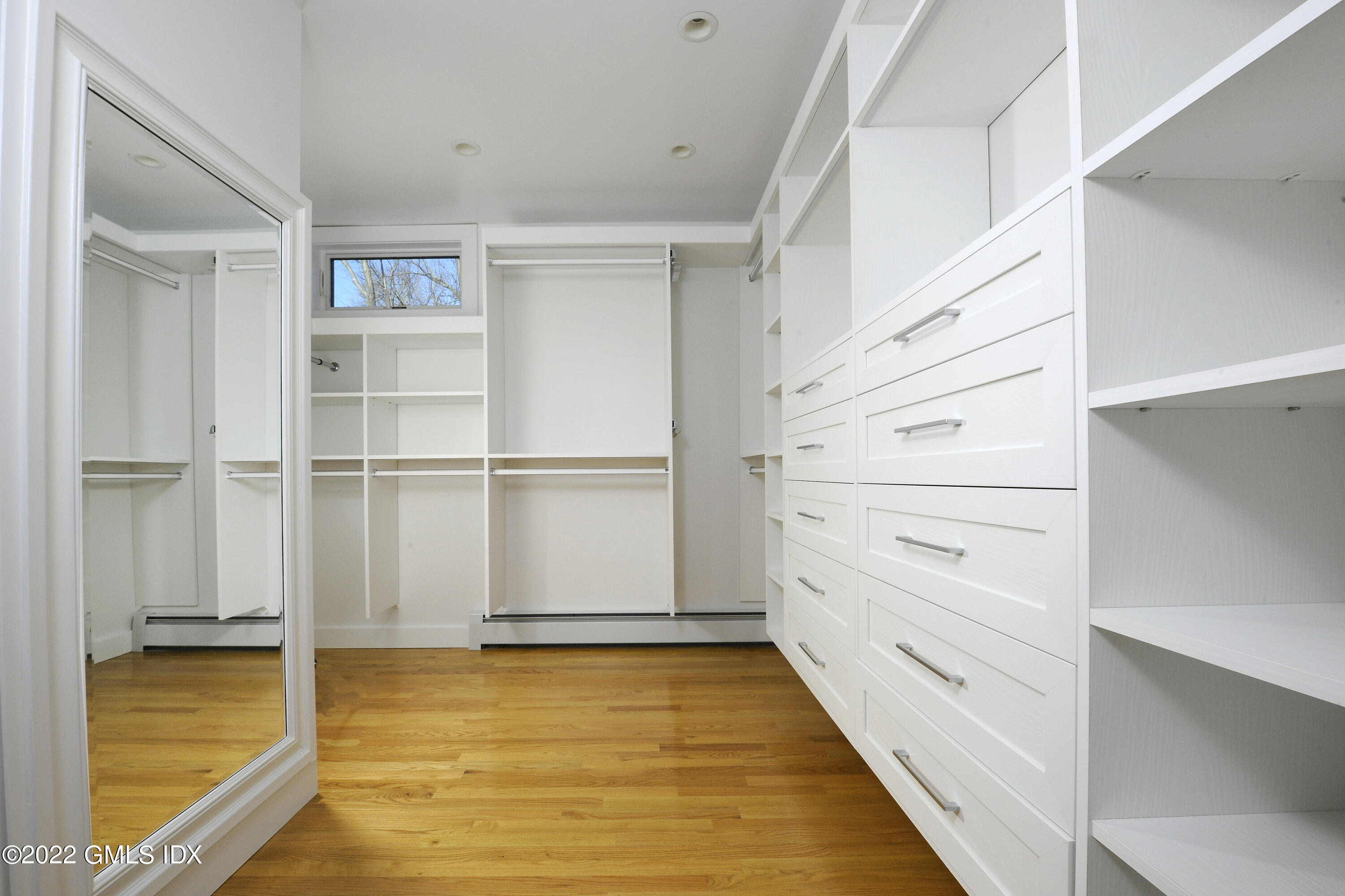 249 Shore Road Greenwich, CT 06830 - Photo 10 of 24 a view of walk in closet with empty racks