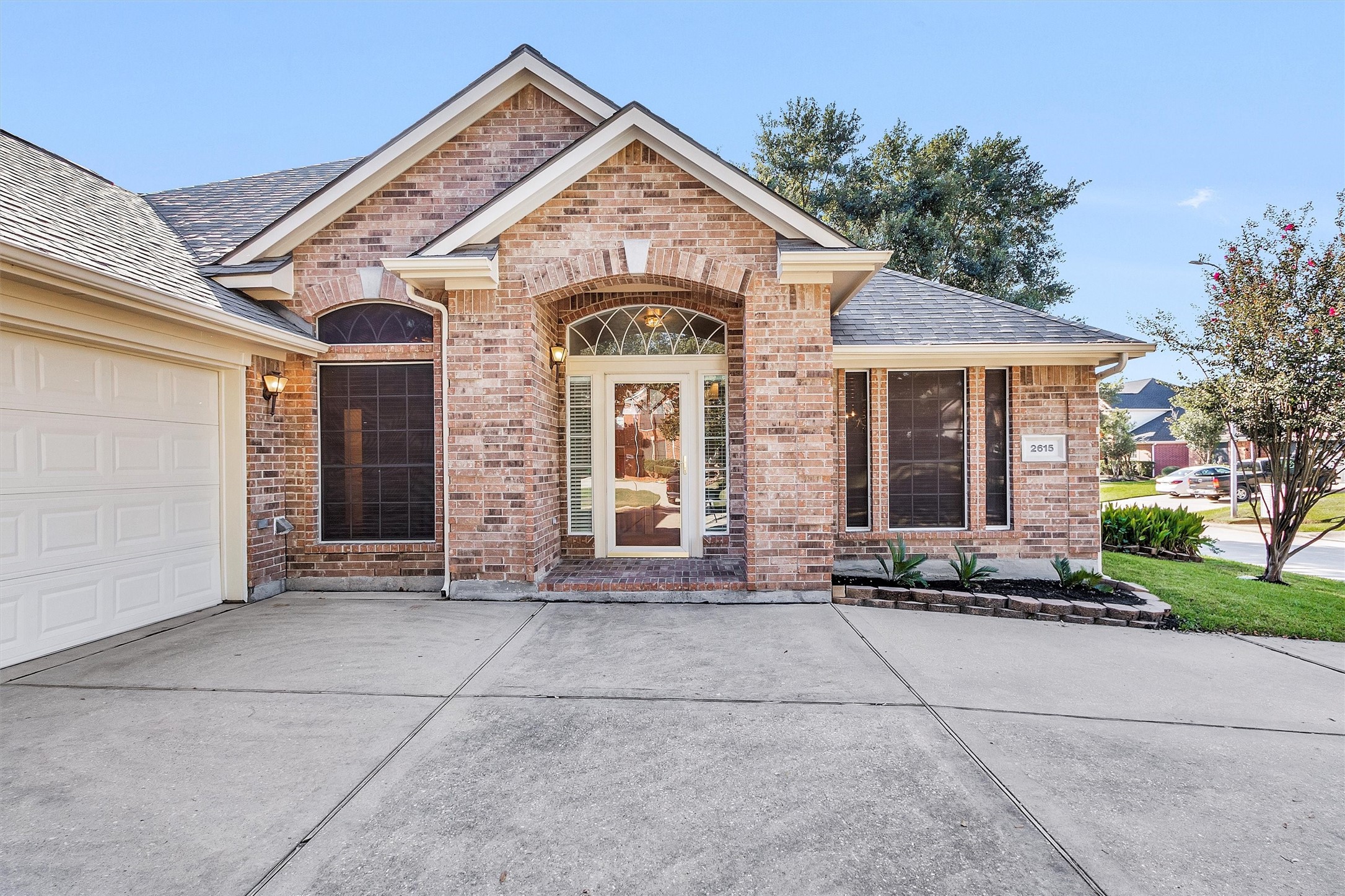 2615 Honeysuckle Walk Spring, TX 77388 - Photo 5 of 39 a front view of a house with garden