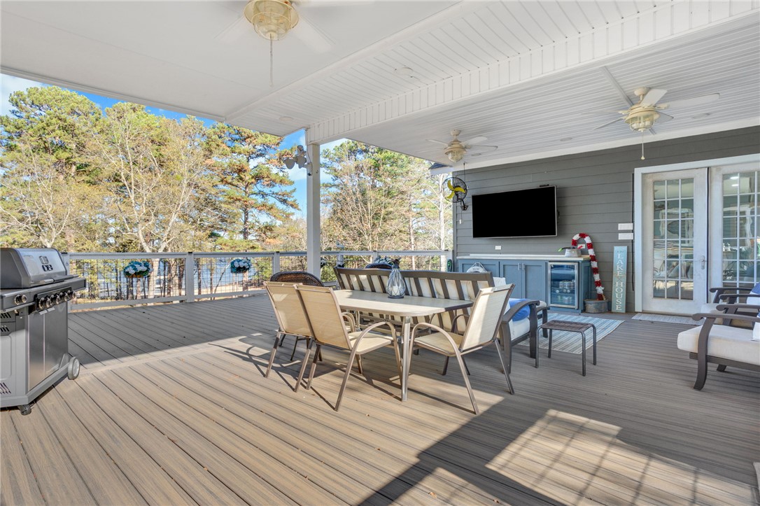 1133 Elrod Ferry Road Hartwell, GA 30643 - Photo 20 of 46 This spacious deck offers an ideal setting for outdoor entertaining and relaxation.