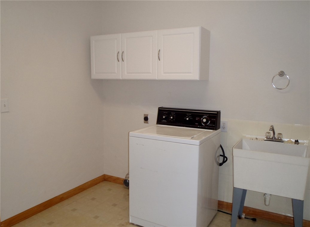 203 Luther Land Road Seneca, SC 29672 - Photo 38 of 50 Laundry room with sink and access to Garage.