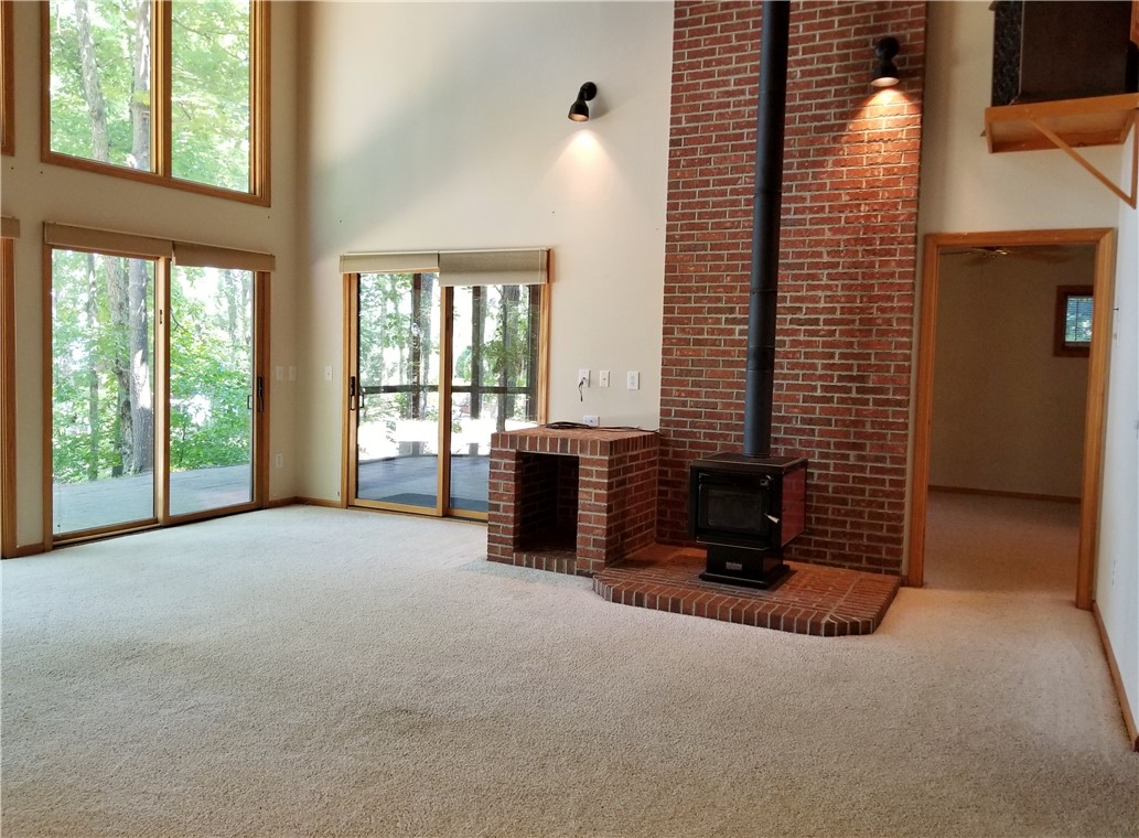 203 Luther Land Road Seneca, SC 29672 - Photo 43 of 50 Spacious Living room with wood burning stove and w