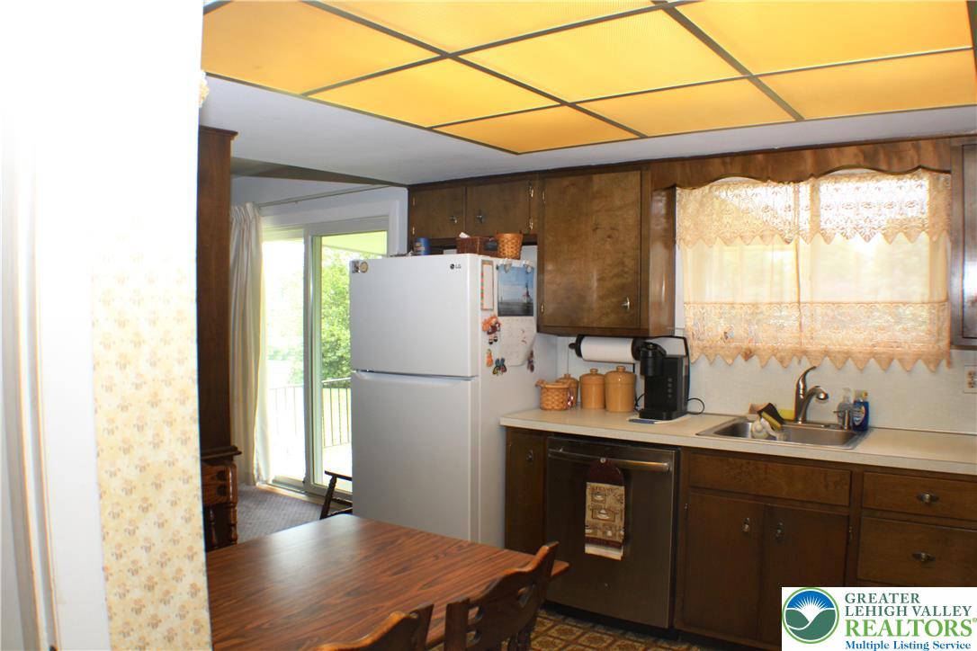 1321 Bushkill Center Road Nazareth, PA 18064 - Photo 18 of 35 Newer Fridge and stainless steel dishwasher