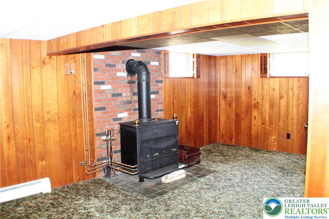 1321 Bushkill Center Road Nazareth, PA 18064 - Photo 23 of 35 There is a wood stove with fully rebuilt chimney (