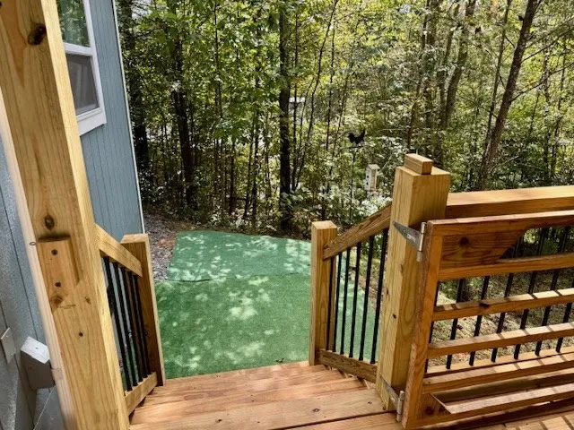 a view of backyard from deck