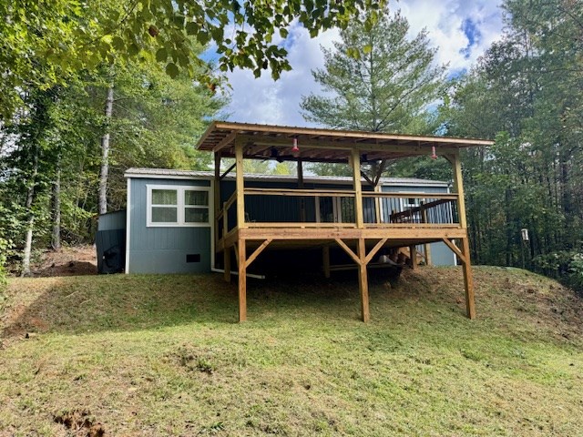 29 Conestoga Trail Murphy, NC 28906 - Photo 4 of 21 a view of a house with backyard porch and sitting area