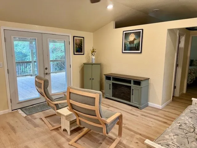 a view of a livingroom with furniture and a fireplace