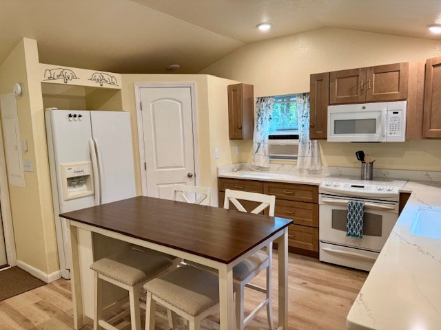 29 Conestoga Trail Murphy, NC 28906 - Photo 7 of 21 a kitchen with stainless steel appliances granite countertop a stove a refrigerator and a sink