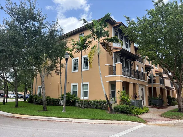 a park with palm trees