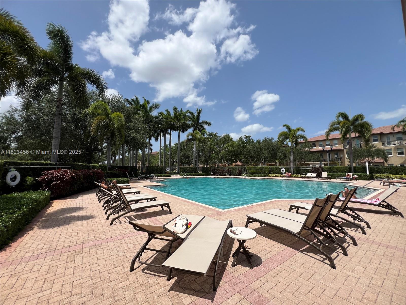 14745 Southwest 9th Street, Unit 3109 Pembroke Pines, FL 33027 - Photo 19 of 27 a view of a terrace with sitting area