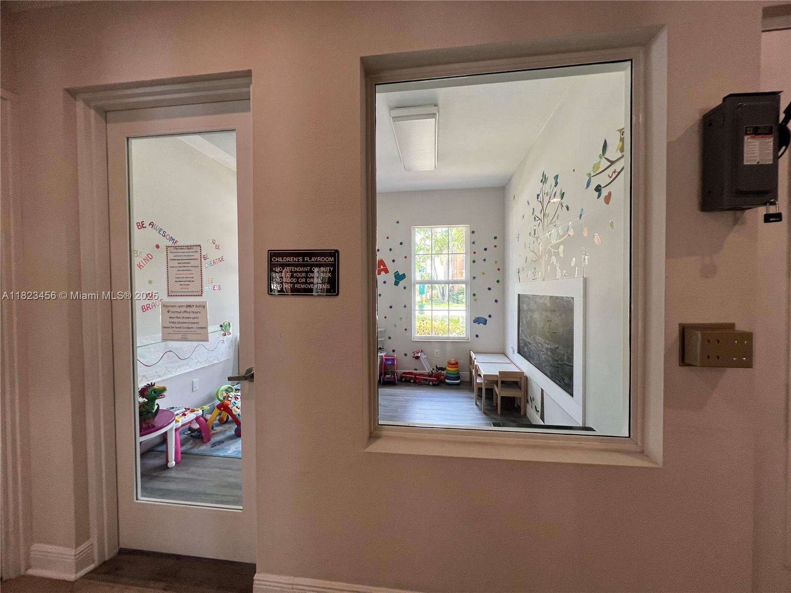 14745 Southwest 9th Street, Unit 3109 Pembroke Pines, FL 33027 - Photo 23 of 27 a view of living room and window