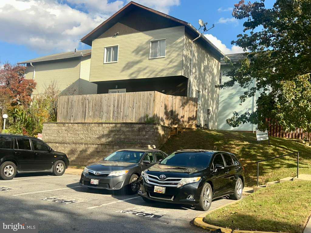 a car parked in front of a house