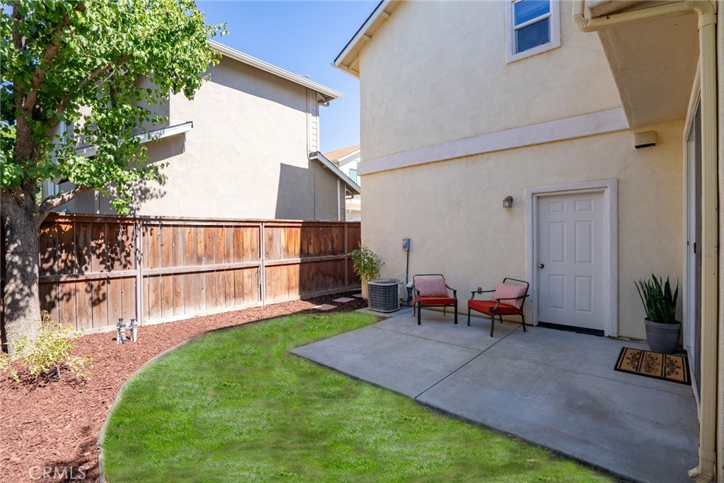 2838 Cottage Lane Paso Robles, CA 93446 - Photo 22 of 29 a view of backyard with seating area and green space